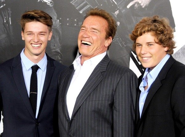 Arnold Schwarzenegger with his sons Patrick and Christopher