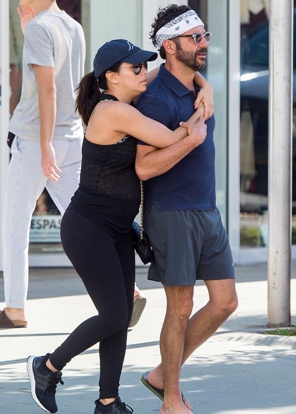 Pregnant Eva Longoria with her husband Jose Baston