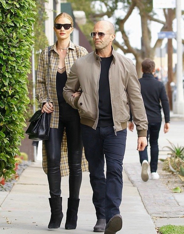 Rosie Huntington-Whiteley with her fiance Jason Statham
