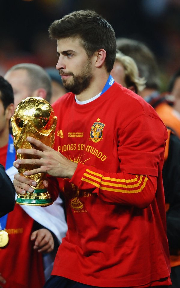 Gerard Piqué with one of his trophies