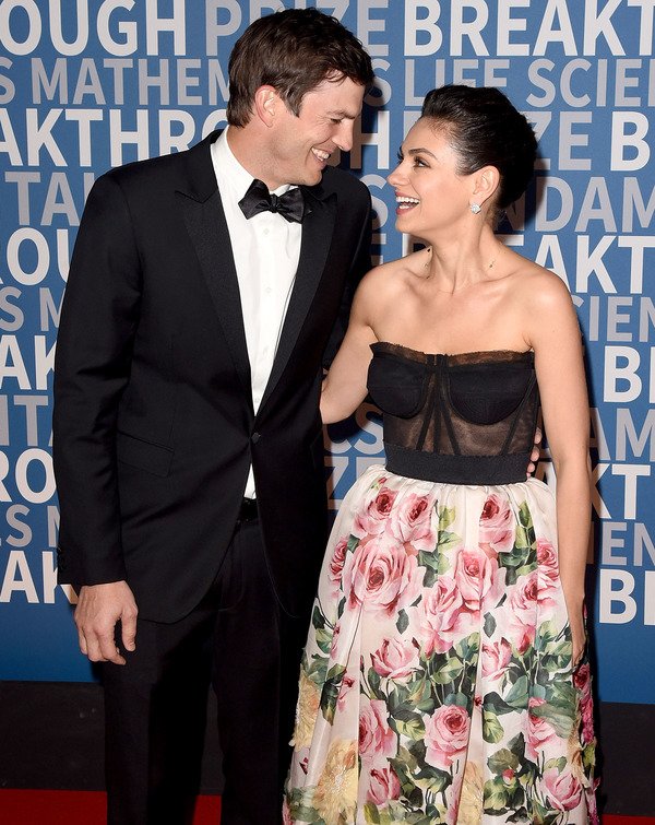 Ashton Kutcher with his wife Mila Kunis